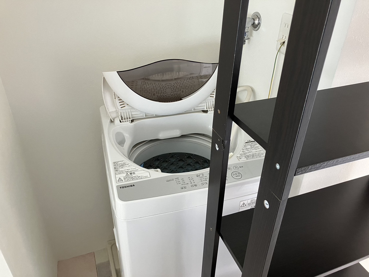 「1Kマンションから洗濯機などの不用品をまとめて回収しました」作業写真